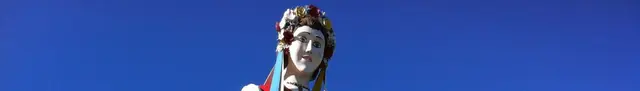 Welcome to Canora statue (Ukrainian woman in floral wreath)